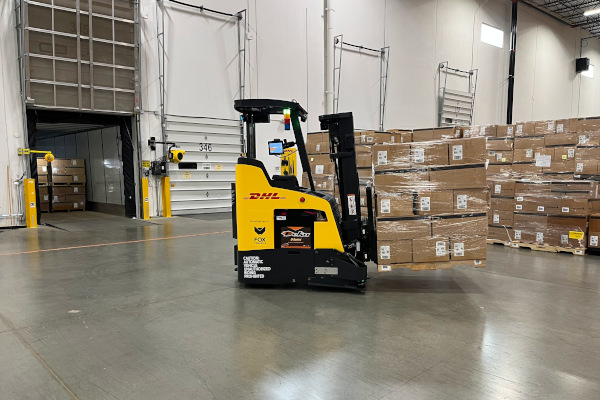<p>A Fox Robotics automated forklift helps load and unload pallets from trailers at a DHL Supply Chain Carhartt omnichannel fulfillment warehouse in Canal Winchester, Ohio. (Photo: Brian Straight/SCMR)</p>
