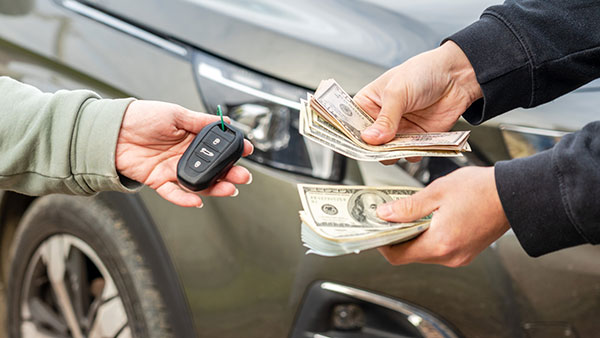 The reality of tariffs is more visible when making a big purchase, such as a car, where a 25% tariff can add $10,000 or more to the price to the vehicle, writes Rosemary Coates.