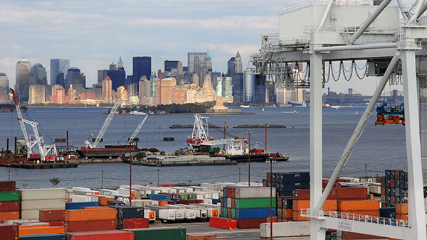 A simulation study of import container flows at the Port of New York and New Jersey found that yard operations are the primary driver of container dwell times and that targeted improvements in rail utilization, gate hours, and commodity-specific logistics strategies could significantly improve port efficiency.