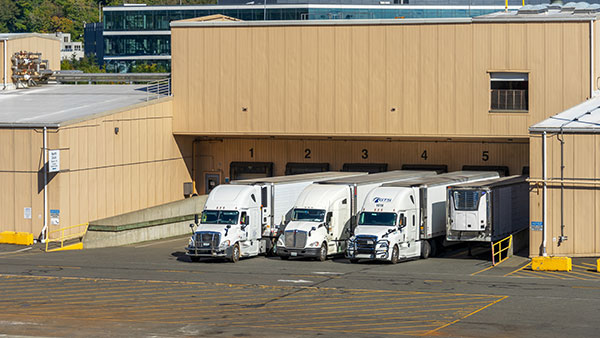 An industrial manufacturer dramatically improved inbound logistics by repurposing Microsoft Bookings into a low-cost dock scheduling system, reducing yard congestion by roughly 90% and demonstrating how creative technology adaptation can accelerate supply chain execution.